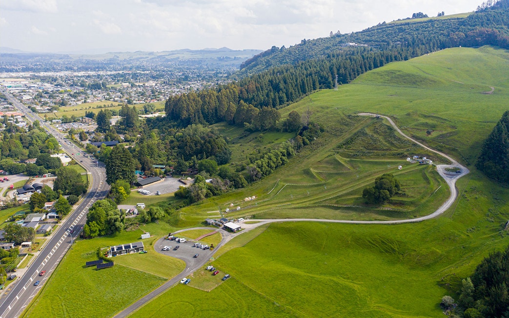 Aerial view of ZORB Rotorua tracks and surrounding landscape in New Zealand.
