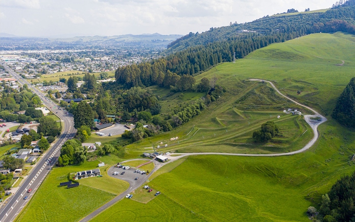 Aerial view of ZORB Rotorua tracks and surrounding landscape in New Zealand.