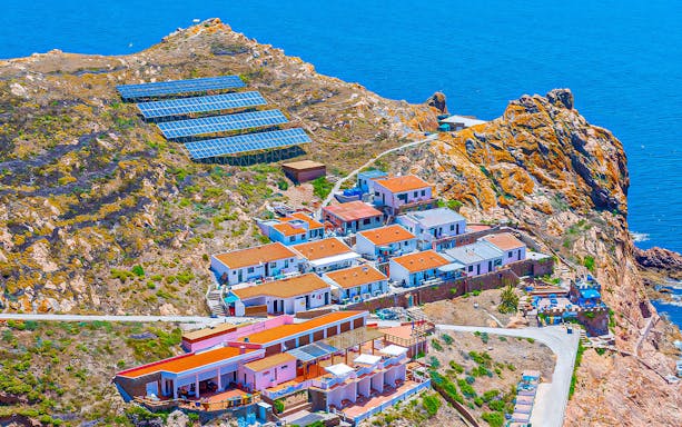 Berlenga Grande Island village with solar panels and ocean view, Portugal.