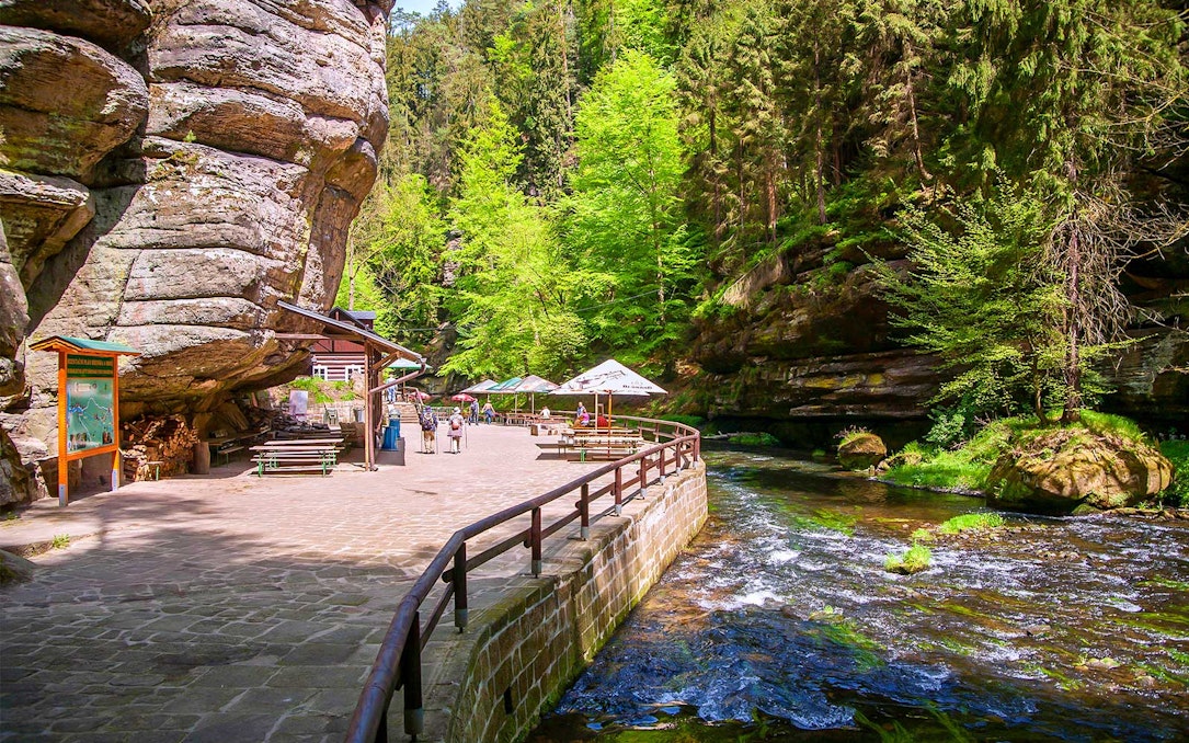 Guided tour path along river in Bohemian Switzerland National Park.