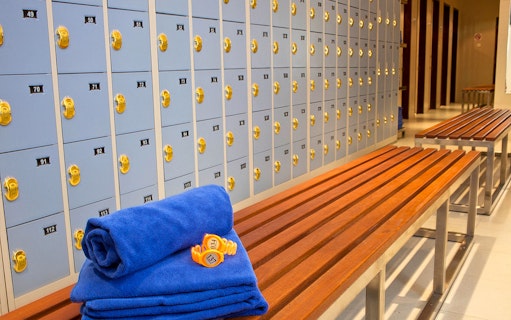 Lockers and benches at Ayung River rafting facility by Mason Adventures.
