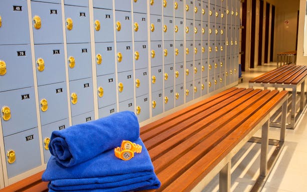 Lockers and benches at Ayung River rafting facility by Mason Adventures.