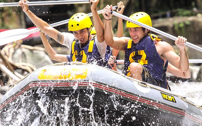 Rafters navigating rapids on Ayung River with Mason Adventures.