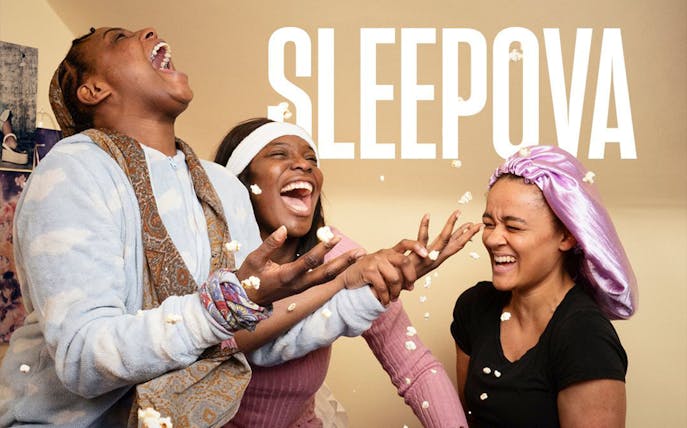 People laughing and throwing popcorn during a sleepover, Sleepova theme.