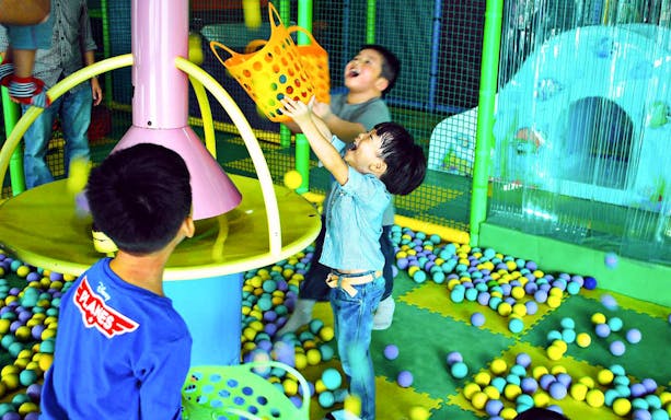 Children playing in ball pit at Jungle Gym, Kuala Lumpur.