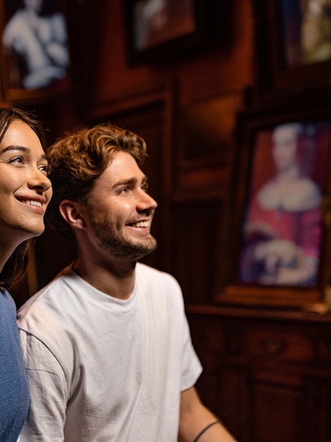 Visitors enjoying art at Rembrandts Amsterdam Experience.