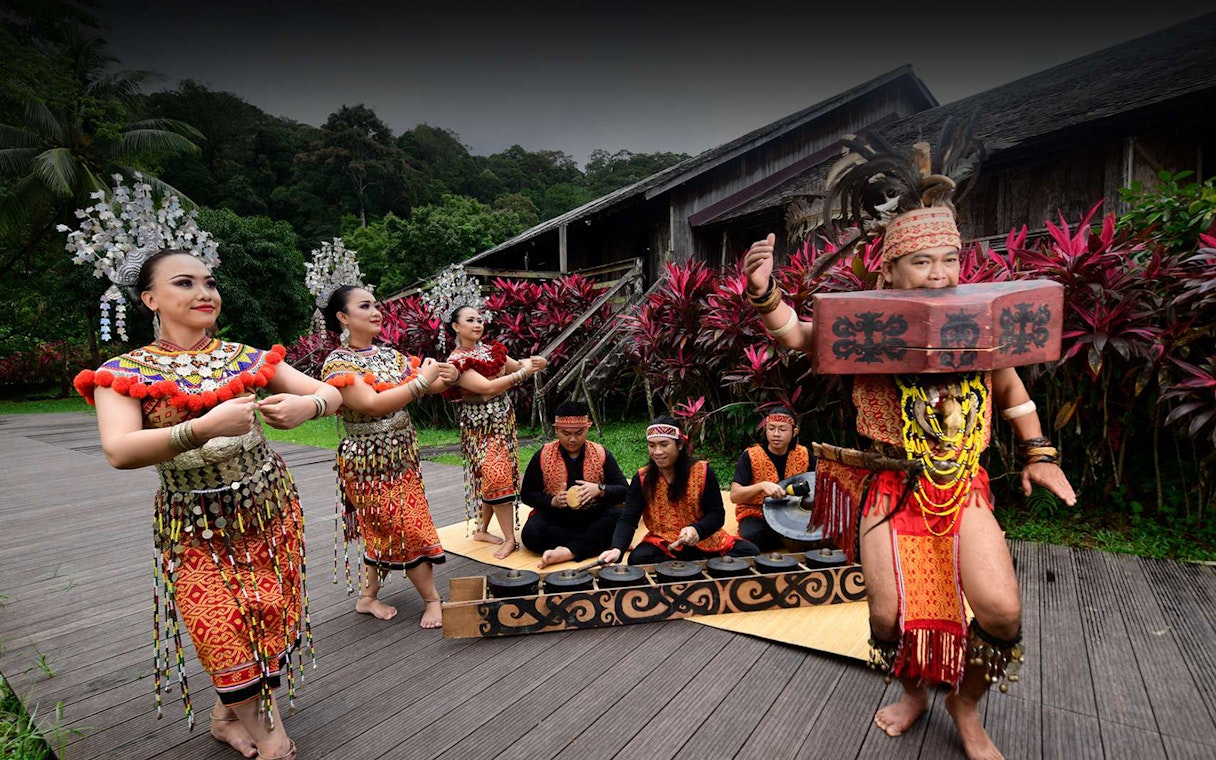 Traditional dance performance at Sarawak Cultural Village during a half-day guided tour.