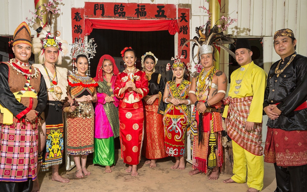 Traditional costumes at Sarawak Cultural Village during a half-day guided tour.