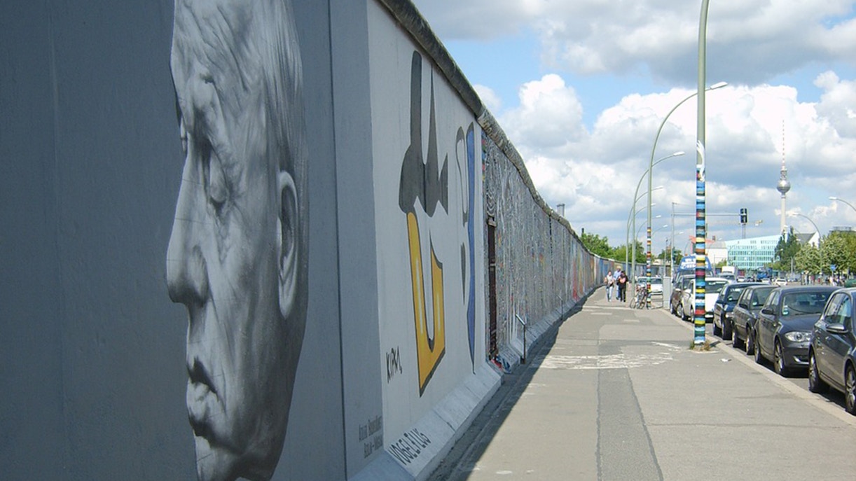 Berlin Wall with murals and street view on guided tour.