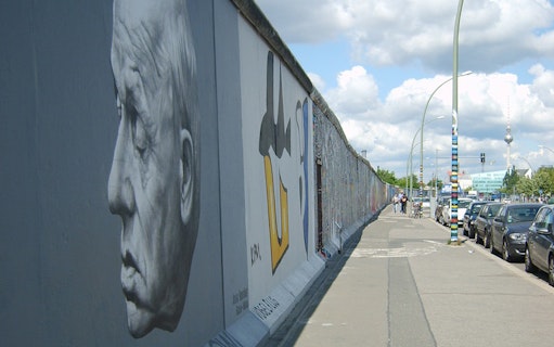 Berlin Wall with murals and street view on guided tour.