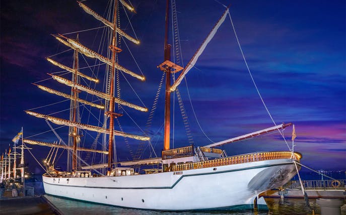 Sirimahannop ship docked at Asiatique The Riverfront during evening dinner cruise.