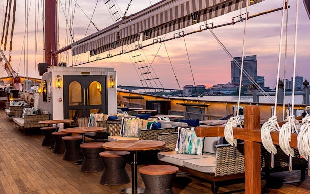 Sirimahannop dinner cruise deck at sunset, Asiatique The Riverfront, Bangkok.