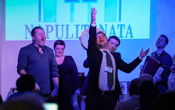 Performers at a traditional Neapolitan music concert in Naples.