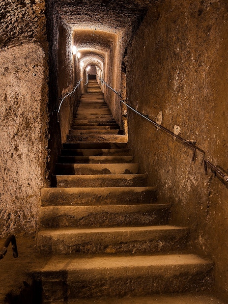 Staircase inside the Bourbon Tunnel during a guided tour in Naples, Italy.