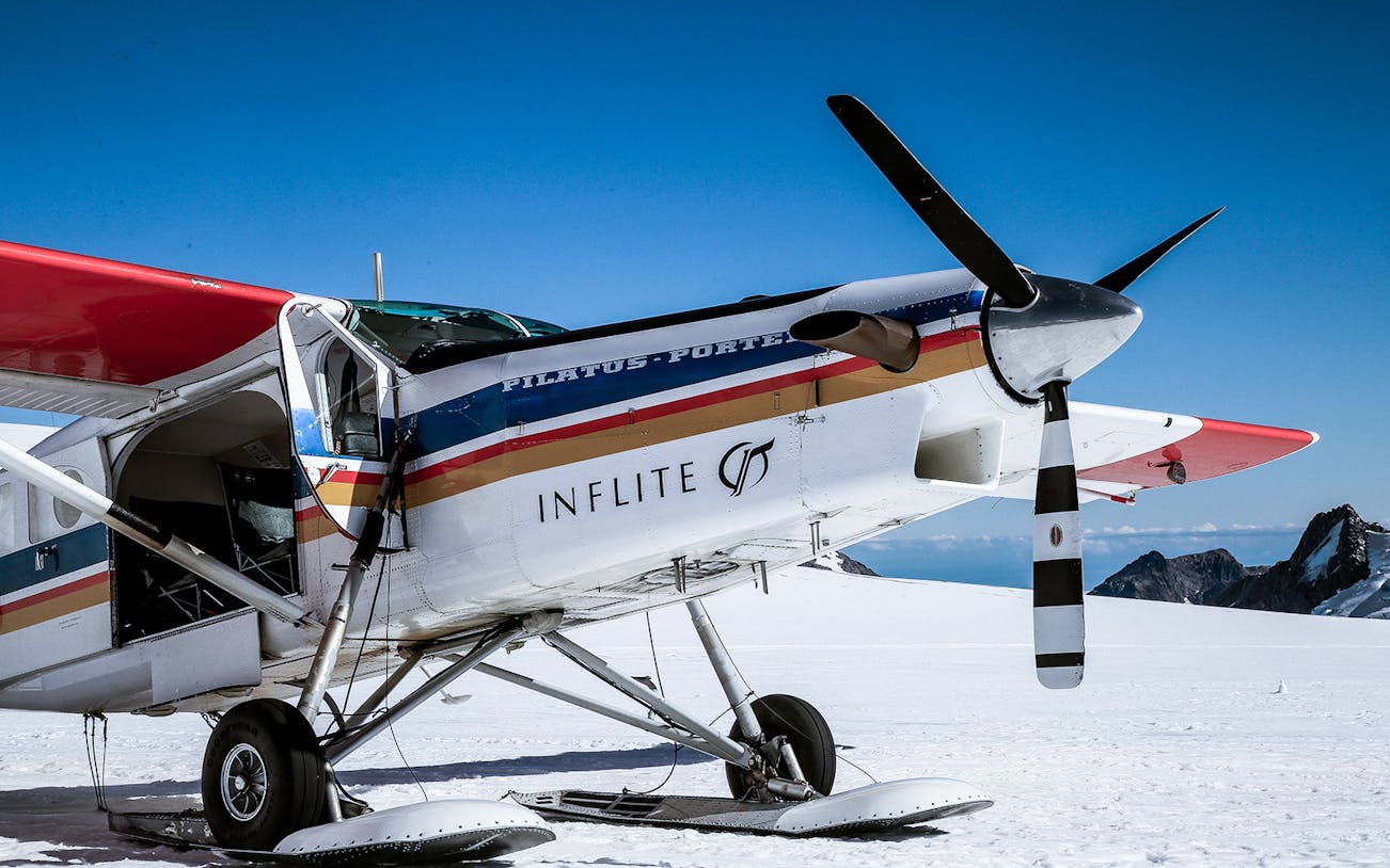 Ski plane on snowy Southern Alps runway for 1-hour aerial tour.