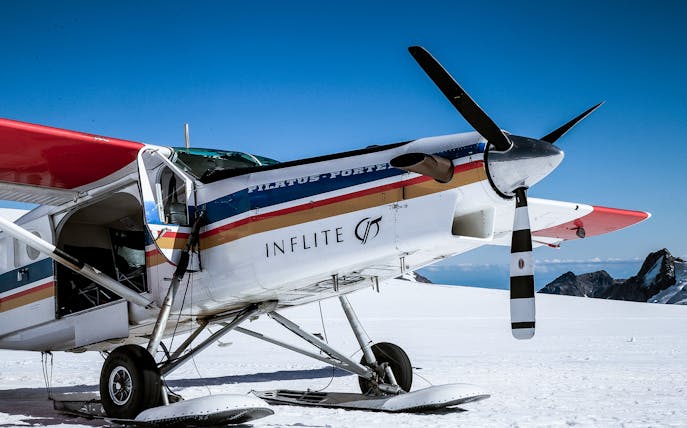 Ski plane on snowy Southern Alps runway for 1-hour aerial tour.