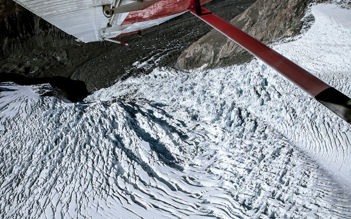 Aerial view of Southern Alps glacier from a helicopter or ski plane.