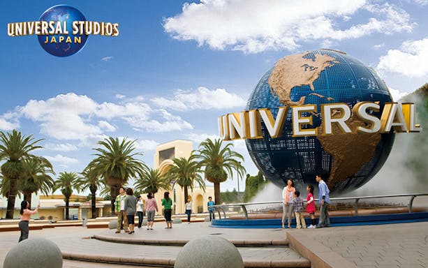 Universal Studios Japan entrance with globe and festive decorations for NO LIMIT! Countdown 2024.