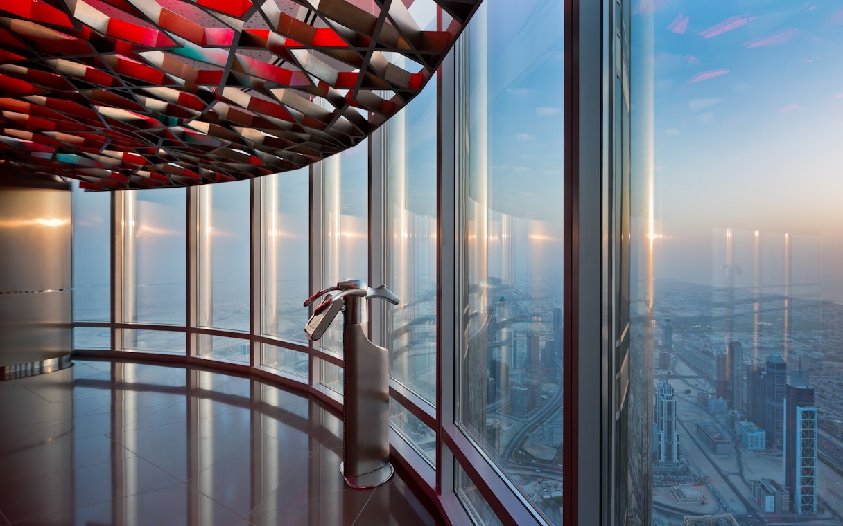 Visitors enjoying sunset views from Burj Khalifa's Level 124 and 125 observation decks in Dubai.