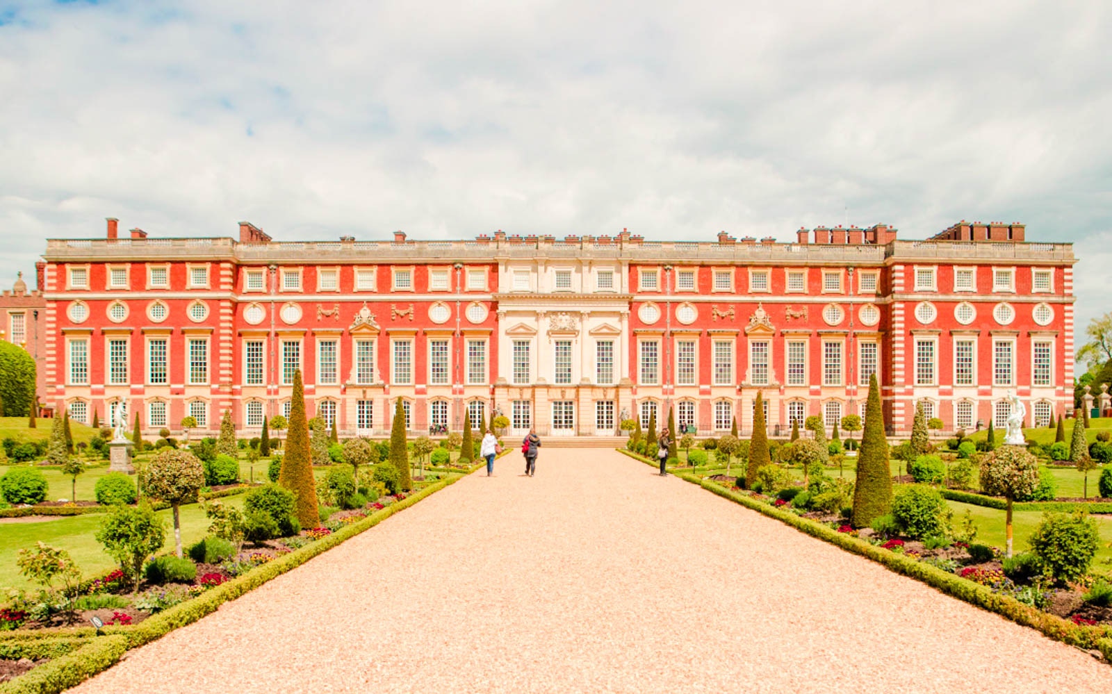 Hampton Court Palace facade with gardens, London.