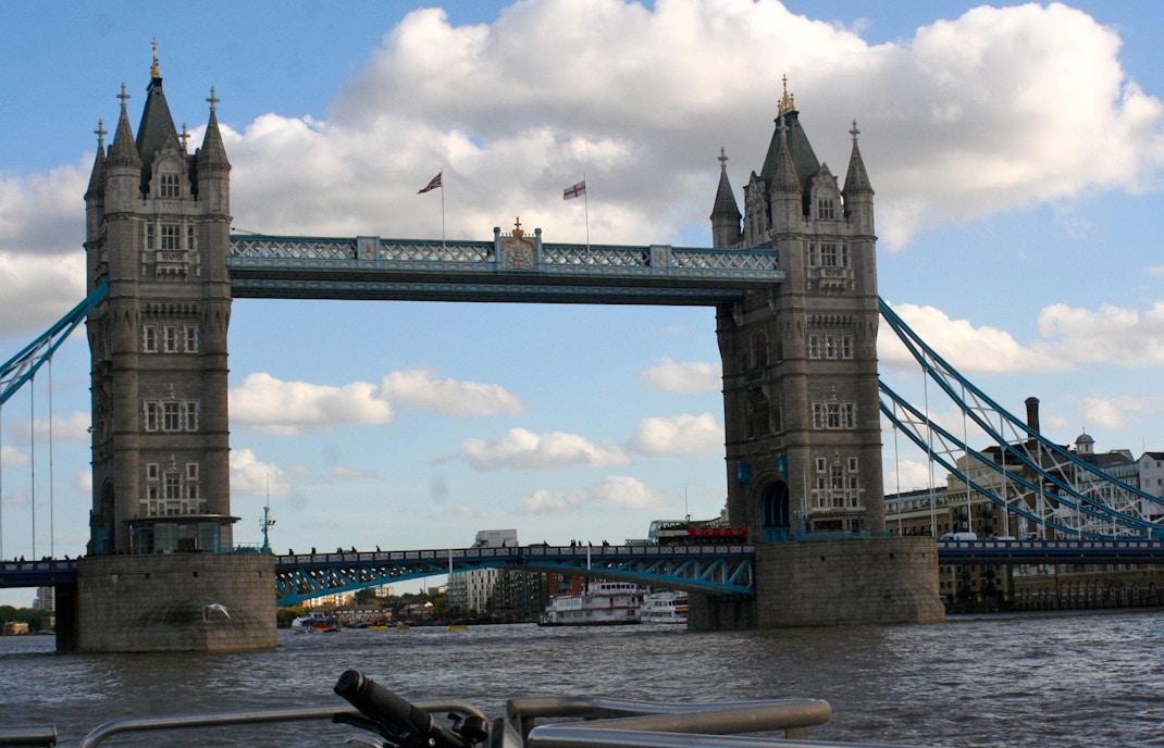Tower Bridge view from Thames River during vintage bus tour and cruise.