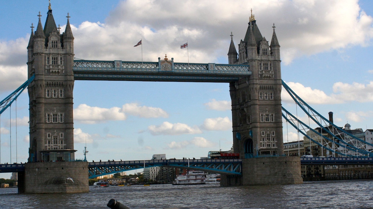 Tower Bridge view from Thames River during vintage bus tour and cruise.
