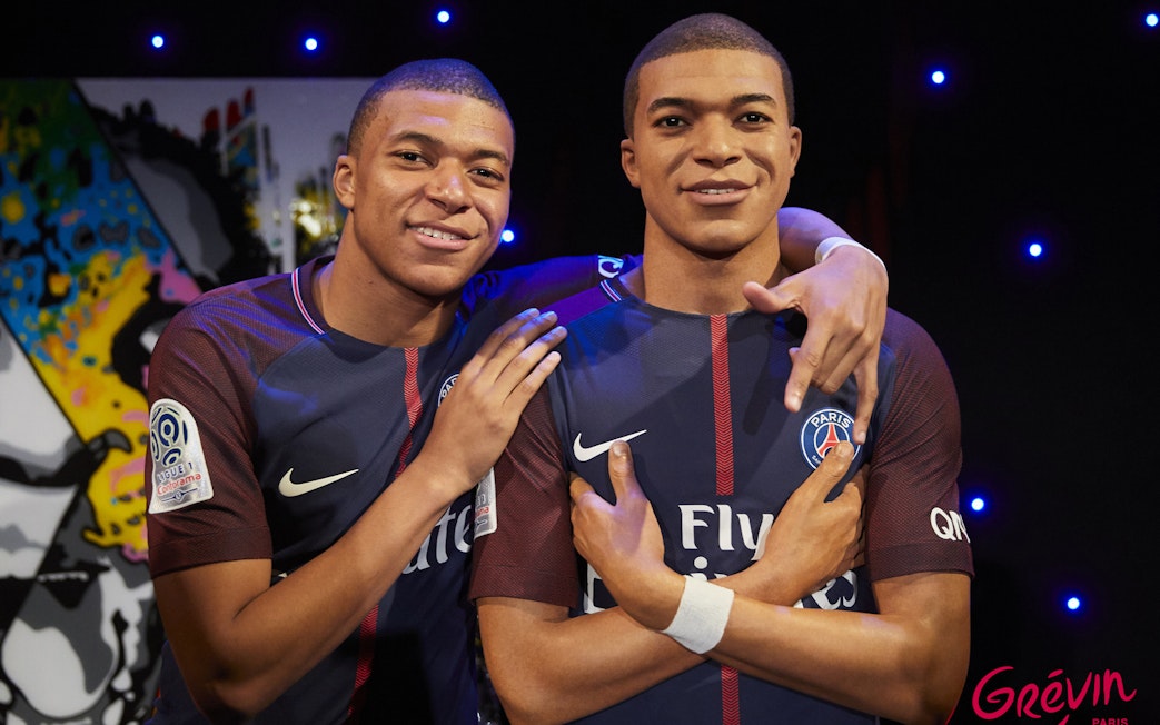 Wax figure of a football player at Grévin Paris wax museum.