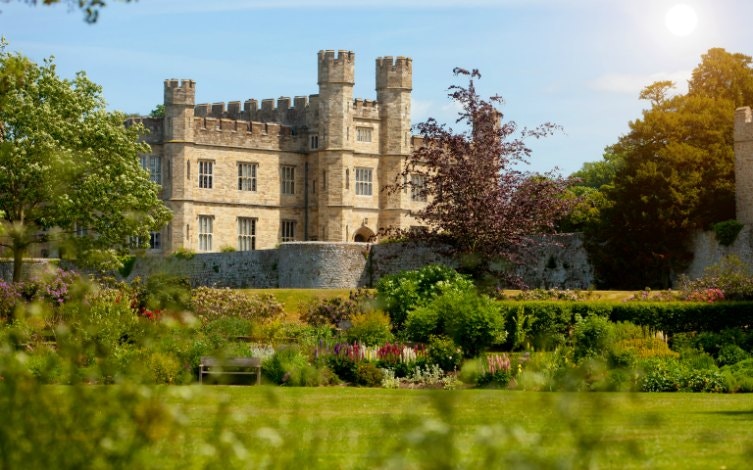 Leeds Castle surrounded by lush gardens in Canterbury.