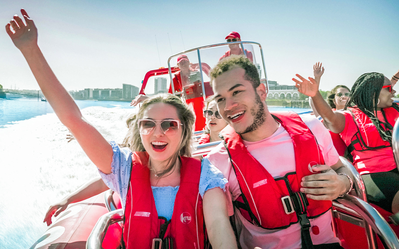 Group enjoying Thames Rockets high-speed boat ride on the River Thames.