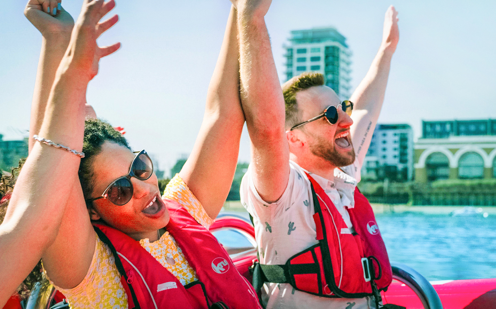 People enjoying the Thames Rockets high-speed boat ride on the River Thames.