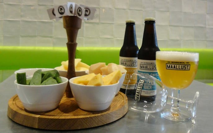 Cheese and beer selection at De Proefzolder Cheese Tasting Tour, featuring Maallust beers.