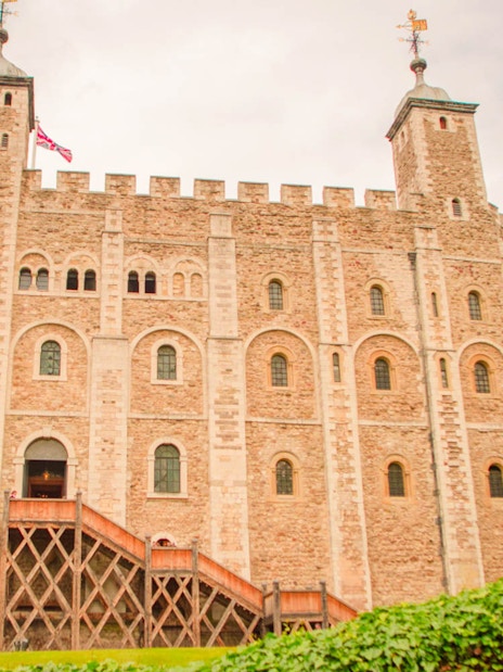 Tower of London White Tower with surrounding greenery, London, England.