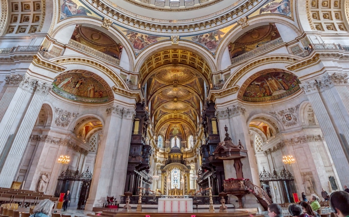 St Paul's Cathedral interior with ornate ceiling and altar, London.