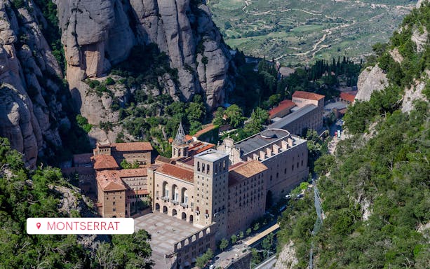 Montserrat Monastery nestled in rocky mountains, Barcelona iVenture Multi Attraction Pass.