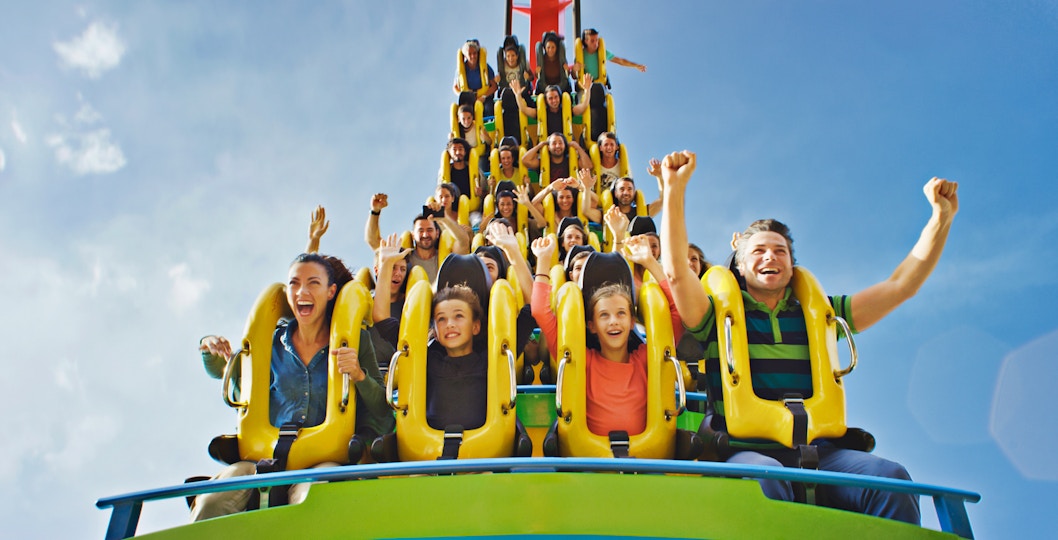 People enjoying a water ride that is sliding down at PortAventura