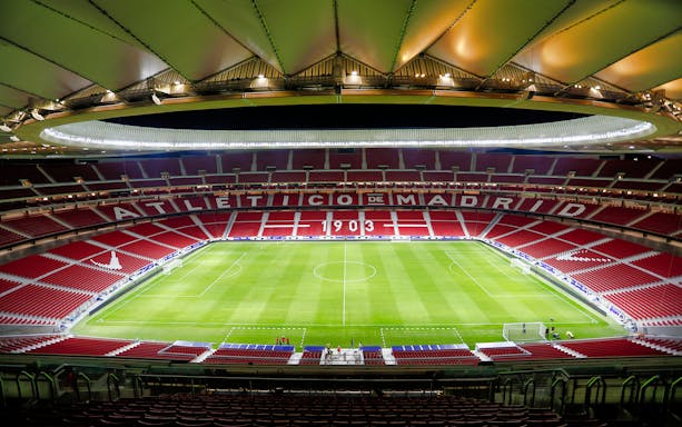 Cívitas Metropolitano Stadium interior with empty seats and field, Madrid.
