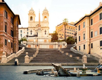 Spanish Steps in Rome with Trinità dei Monti church in the background.