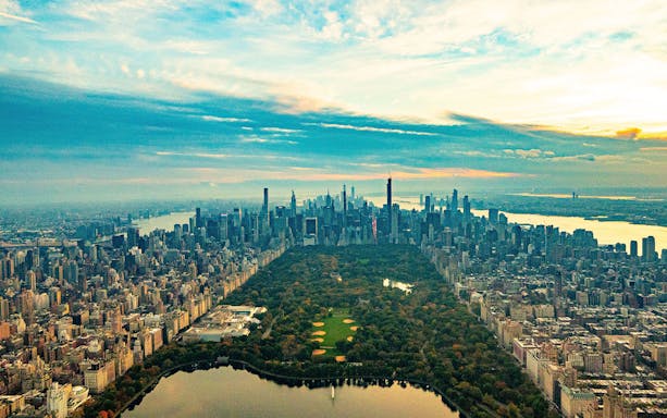 Aerial view of Central Park and Manhattan skyline during a helicopter tour in New York City.