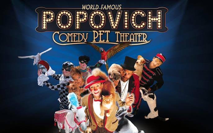 Performers and animals at Popovich Comedy Pet Theater show.