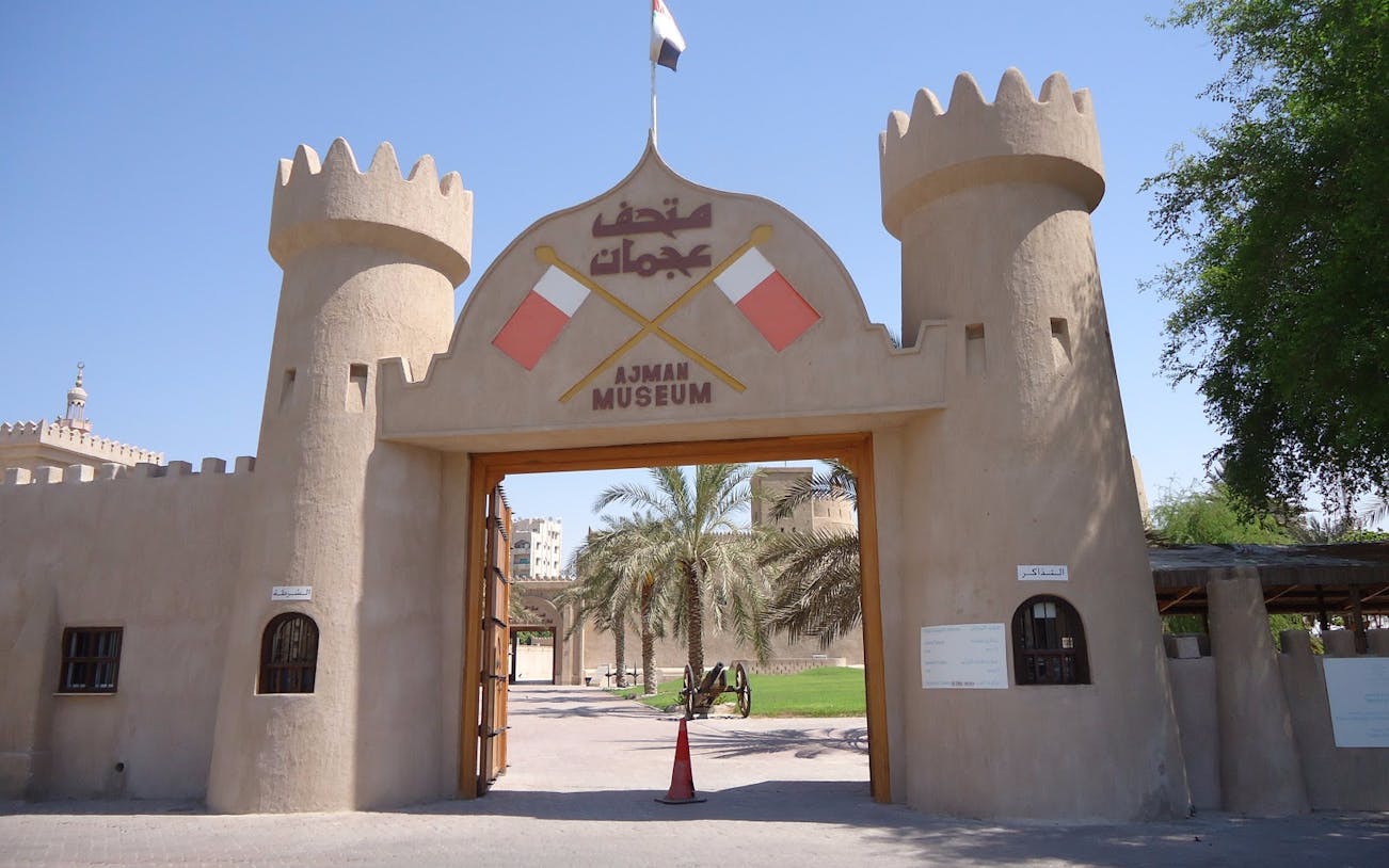 Ajman Museum entrance with traditional architecture on Sharjah tour.