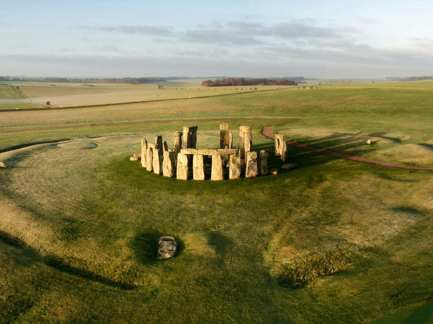 Stonehenge stone circle on a grassy plain in Wiltshire, England.