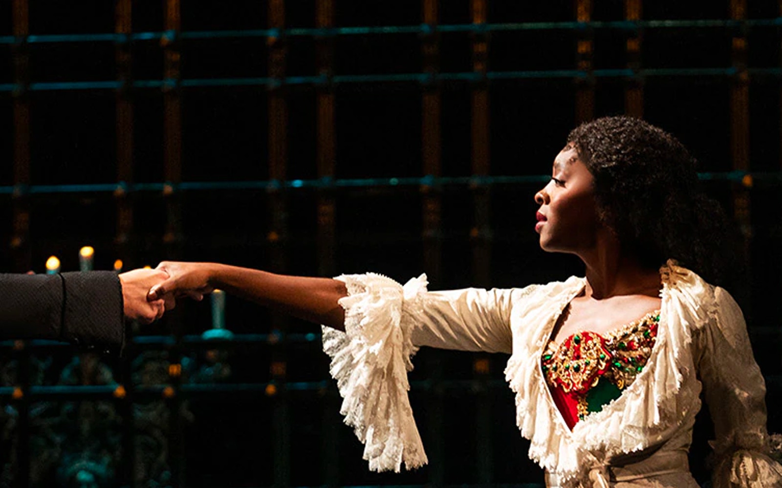 Performer in costume during Phantom of the Opera scene.