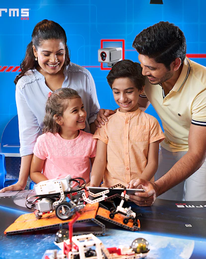 Family exploring robotics at Legoland Dubai.