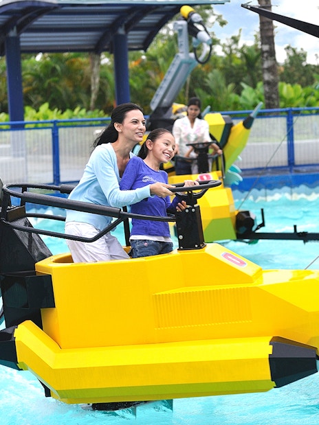 Visitors enjoying a water ride at Legoland Dubai.