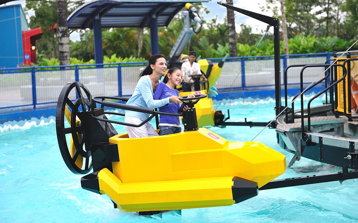 Visitors enjoying a water ride at Legoland Dubai.