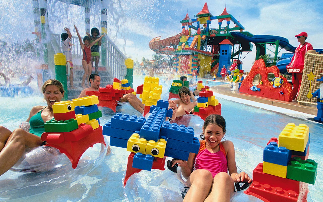 Visitors enjoying water rides at LEGOLAND® Water Park Dubai.