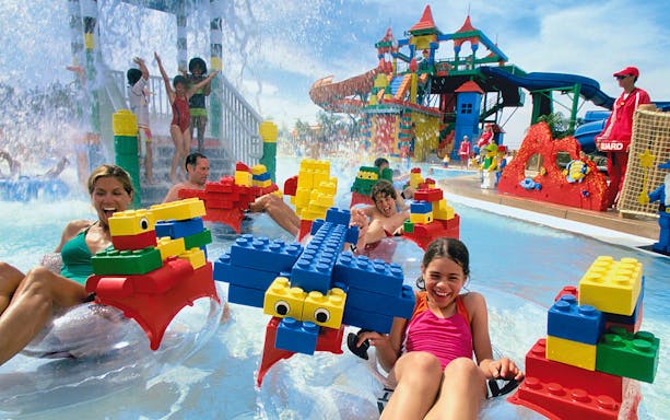 Visitors enjoying water rides at LEGOLAND® Water Park Dubai.