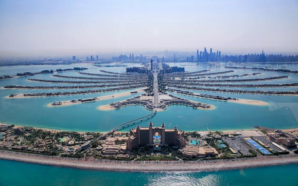 Aerial view of Palm Jumeirah and Atlantis Hotel during a 15-minute helicopter tour in Dubai.