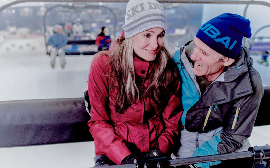 Couple enjoying Ski Dubai Snow Park with all-day access pass.