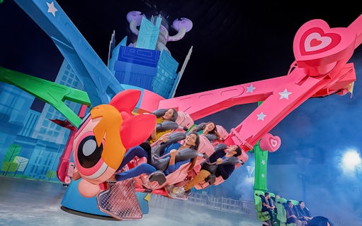 Visitors enjoying a themed ride at IMG Worlds of Adventure, Dubai.